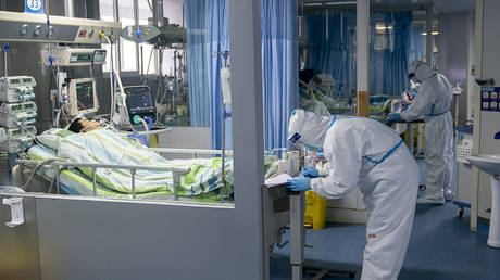 Medical staff work in the intensive care unit of Zhongnan Hospital in Wuhan, central China's Hubei Province