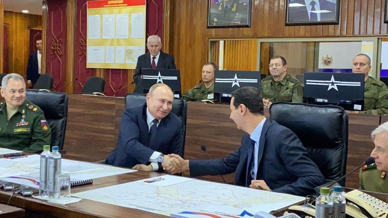 Resultado de imagem para pictures of Putin makes surprise visit to Syria,