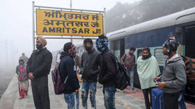 Dozens injured in India as passenger & cargo trains COLLIDE due to thick fog (PHOTOS)