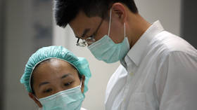 Chinese authorities confirm 136 NEW cases of deadly virus in 2 days