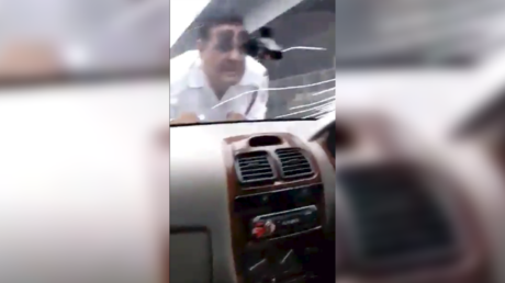 Fast and furious: Irate driver takes Delhi traffic cop for 2km joyride on hood of his car (VIDEO)