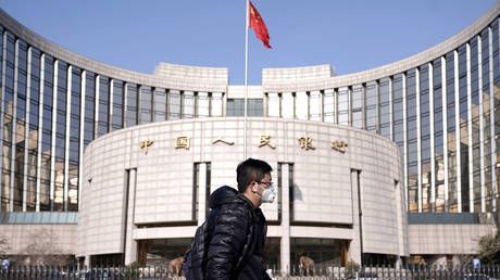 A man wearing a protective mask in Beijing, China. February 3, 2020. © Reuters /  Jason Lee