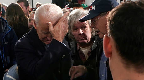 FILE PHOTO: Joe Biden greets his supporters following a campaign event in Nashua, on February 4, 2020.