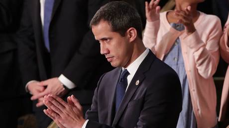 Venezuela's opposition leader Juan Guaido gestures during President Donald Trump's State of the Union address to a joint session of Congress in Washington, DC, February 4, 2020.