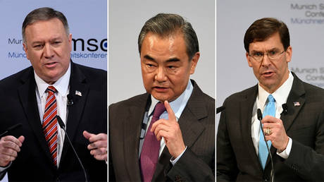 Mike Pompeo, Wang Yi and Mark Esper at the Munich Security Conference © Reuters/Andreas Gebert/Andrew Caballero-Reynolds