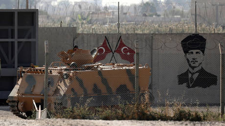 FILE PHOTO. Turkish soldiers in an armored vehicle return from the Syrian town of Tal Abyad. ©REUTERS / Huseyin Aldemir