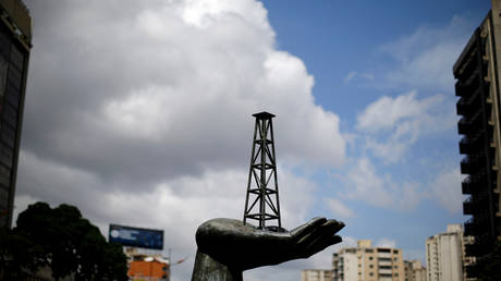 A sculpture is seen outside a building of Venezuela's state oil company PDVSA in Caracas