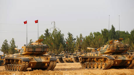 FILE PHOTO: Turkish Army tanks are stationed on the Turkish-Syrian border in the southeastern Gaziantep province, Turkey, on August 25, 2016.