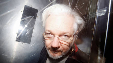 Julian Assange leaves Westminster Magistrates Court in London