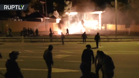 WATCH protesters hurl stones at police during second night of riots against migrant camps in Lesbos