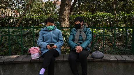 FILE PHOTO Residents in Shanghai, China. February 27, 2020. © AFP / Hector Retamal