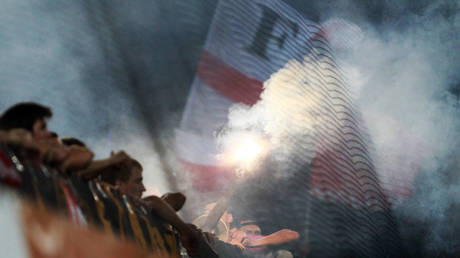 Shocking mass brawl breaks out between football fans in Moscow metro station (VIDEO)