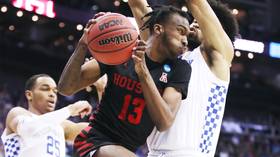 'Yo! He just bit him!' College basketball player DeJon Jarreau admits BITING opponent's leg in violent moment of madness (VIDEO)