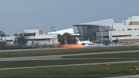 WATCH private jet make fiery belly-landing at Daytona Beach airport in Florida