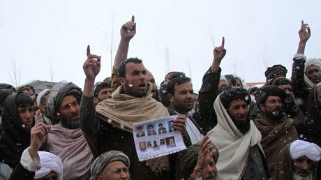 FILE PHOTO: Afghans protest against US special forces accused of overseeing torture and killings