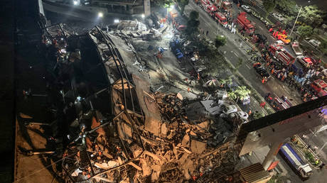 Aerial view of the collapsed hotel.