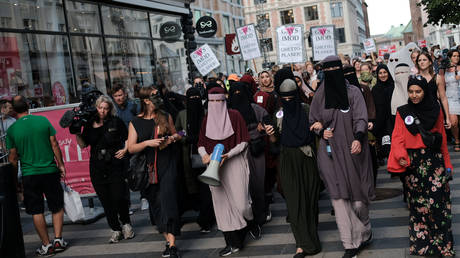 Protest in Aarhus, Denmark, 2018 in defiance of the Danish Governments ban on the burka and niqab. © Getty Images/NurPhoto/Aleksander Klug