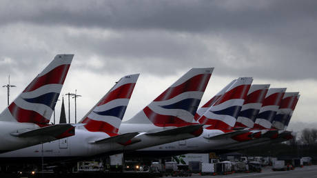 Heathrow airport SHRINKS operations but remains open in face of coronavirus threat