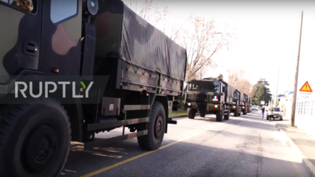 Italian army hauls Covid-19 victims’ bodies to lesser-hit regions as medics decide who gets help first in makeshift tents (VIDEOS)