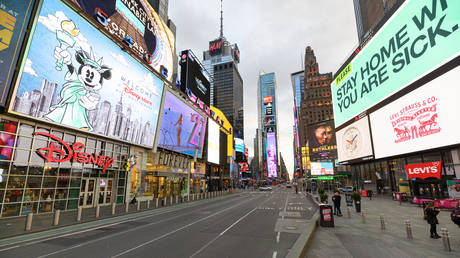 A view of Times Square hours ahead of the implementation of 'New York State on PAUSE', March 22, 2020 in New York City