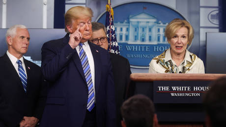 Vice President Mike Pence, US President Donald Trump and Attorney General William Barr listen to Ambassador Debbie Birx, the White House coronavirus response coordinator, address the Covid-19 response briefing at the White House in Washington, DC, March 23, 2020.