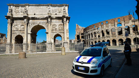 Colosseum and Arch of Constantine during the Coronavirus pandemic (Covid-19). Rome (Italy), March 19th, 2020