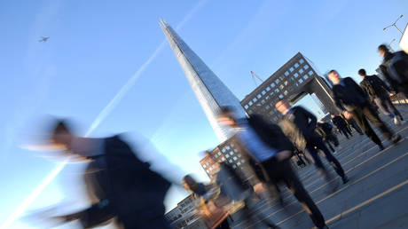 The Shard looms over London © Reuters / Toby Melville