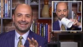 Coffee break! NFL Network reporter forced into quick change after POURING COFFEE over himself on live TV (VIDEO)