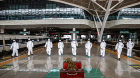 Trains and buses disinfected in Wuhan & checkpoints removed as city prepares to end lockdown (VIDEOS)