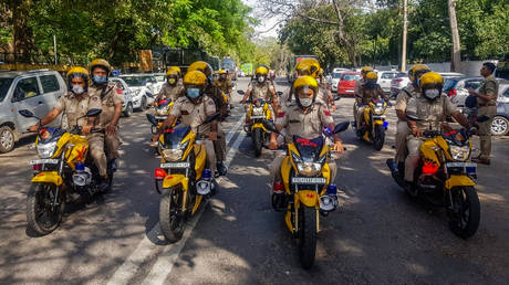 Members of the new Covid Patrol, charged with spreading awareness and enforcing the government-imposed nationwide 21-day lockdown on April 01, 2020 in New Delhi, India