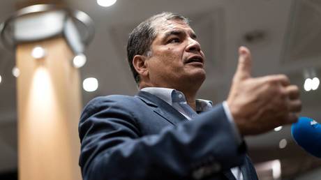 FILE PHOTO: Rafael Correa gives a press conference at the European Parliament in Brussels © AFP / Kenzo TRIBOUILLARD