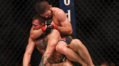 Photographer behind iconic image of Khabib submitting McGregor dies of coronavirus at age 48