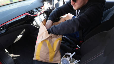 Customers wait in line for HOURS at reopened McDonald&rsquo;s drive-thru in still-locked-down France