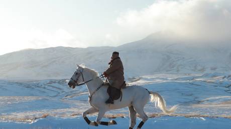 Kim Jong-un rides a horse on Mount Paektu in a photo released on October 16, 2019. © Global Look Press / Korean Central News Agency