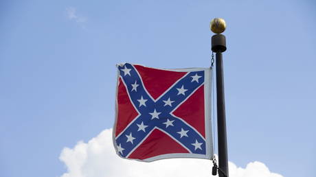 Confederate battle flag flies at the South Carolina State House grounds in Columbia