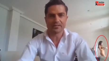 Drama erupts after half-naked woman bombs broadcast of Spanish celebrity journalist
