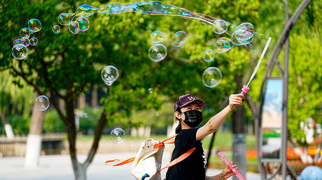 Beijing to lower emergency Covid-19 response level as country slowly returns to normal