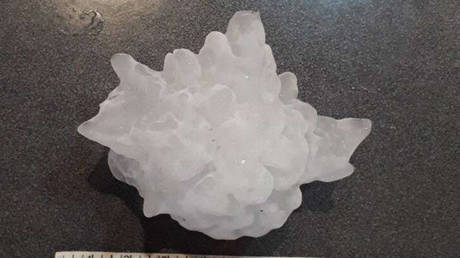 Hail no! &lsquo;Gargantuan&rsquo; ice missiles from SUPERCELL THUNDERSTORM can smash through house roofs