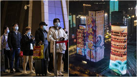 Making a comeback: Wuhan aglow as outbound travel ban lifted & residents flock to train stations (PHOTO, VIDEO)