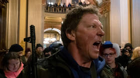 Democrats fume as armed protesters descend on Michigan Capitol to protest lockdown