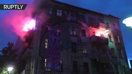 WATCH protesters light flares, gather for Walpurgis Night in Berlin despite ban on mass rallies during Covid-19 lockdown