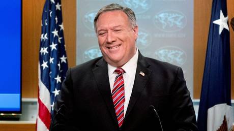 FILE PHOTO. Mike Pompeo smiles during a news conference. © Reuters / Andrew Harnik