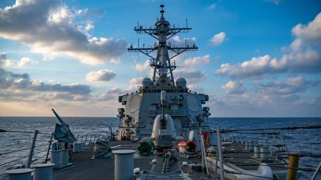 The Arleigh-Burke class guided-missile destroyer USS Barry (DDG 52) conducting underway operations on April 28, 2020 in the South China Sea