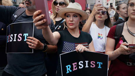Alyssa Milano goes on defensive after showing off her KNITTED mask