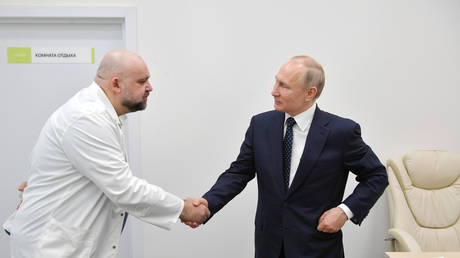 Russian President Putin visits a hospital for patients infected with coronavirus disease (COVID-19) on the outskirts of Moscow