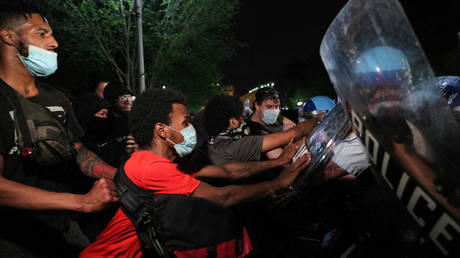 ‘Tear gas’ sprayed as riot cops face off against angry crowd outside White House amid nationwide George Floyd protests
