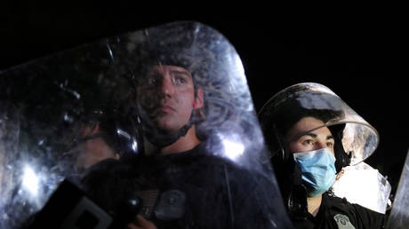 US Secret Service uniformed division officers keep demonstrators away from the White House during a protest in Washington, US May 30, 2020