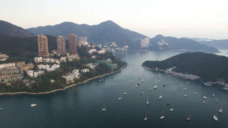 FILE PHOTO: Hong Kong's Deep Water Bay, surrounded by Shouson Hill, Brick Hill, Violet Hill and Middle Island © Getty Images / LightRocket / Stephen J. Boitano