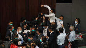 Hong Kong legislature descends into chaos as lawmakers BRAWL (VIDEOS)
