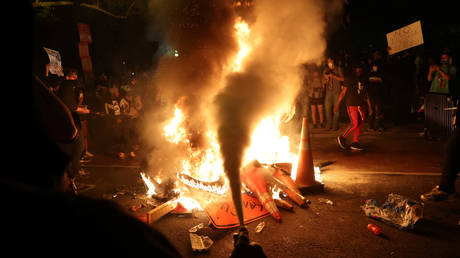 Protesters at a bonfire during a rally against the death of George Floyd, Washington, DC, US, May 31, 2020